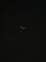 Obraz na płótnie Canvas Waning crescent moon on a night sky