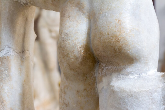 Alger (Algiers), Algeria, April 19 2023 : detail (buttocks) of a Roman statue of Hermes found in Chlef (second century A.D.) on display in the National Museum of Antiquities of Algiers (Alger).