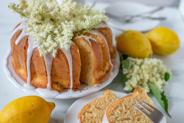 Healthy sweet home made elderflower sponge cake on a table