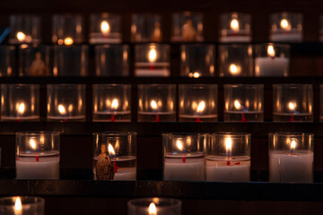 Candles lit in a Catholic church