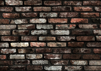 Wide old colorful panoramic brick wall