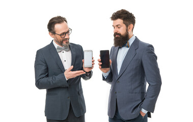presenting product. business communication on meeting. team success. partnership of men speaking on phone. collaboration and teamwork. bearded businessmen in formal suit. mature men. Agile business