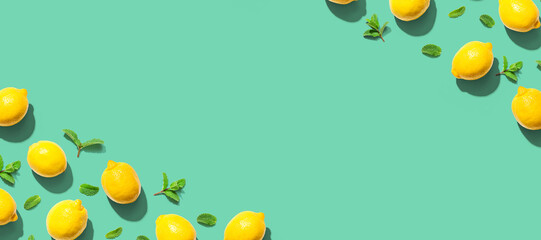 Fresh yellow lemons with mints overhead view - flat lay