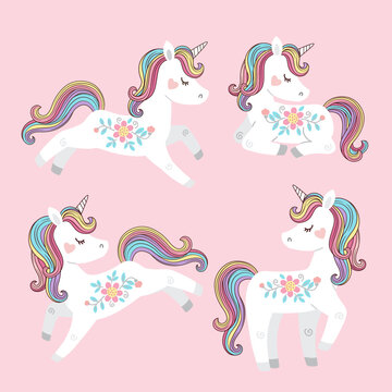 Vector set of beautiful white unicorns with flowers and rainbow mane and tail