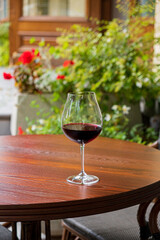 glass of red wine on terrace