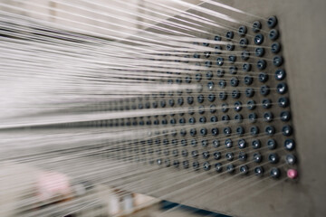 Glass-formed filaments in the factory before processing, soft focus