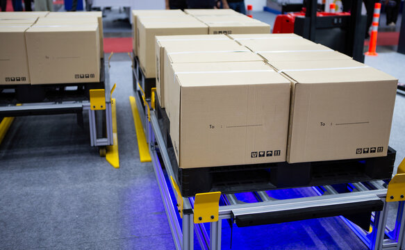 Shuttle pallets in modern manufacturing warehouses.