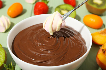 Concept of tasty sweet food - chocolate fondue
