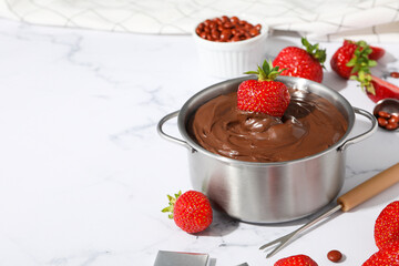 Concept of tasty sweet food - chocolate fondue