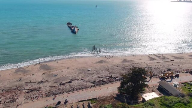 Aerial of the broken Seacliff Pier in Aptos, California, caused by a storm