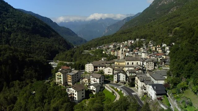 Aerial View Of Piuro Commune Located In Lombardy Valley. Ascending With Tilt Down Shot