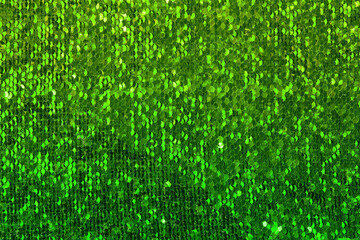 Green, golden, glitter background, shiny Green fabric with sequins.