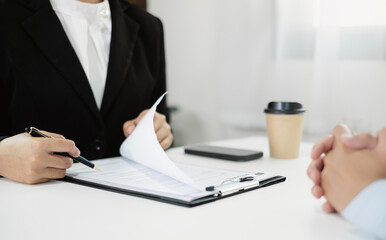 HR Manager talks to job applicants for job interviews about careers and Her personal history in the company. Employment and Recruitment concepts