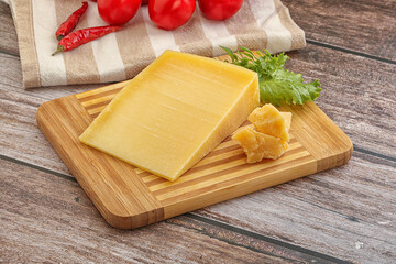 Parmesan hard cheese with small pieces