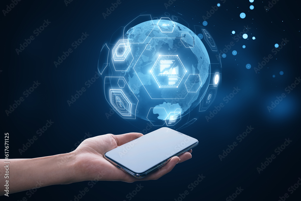 Poster close up of female hands using mobile phone with digital business globe hologram on blurry backgroun