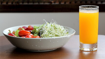 Salad and Orange Juice as Healthy Snack