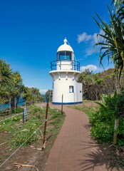 Fototapeta na wymiar Vertical shot of the Fingal Head lighthouse in Fingal Head, New South Wales, Australia