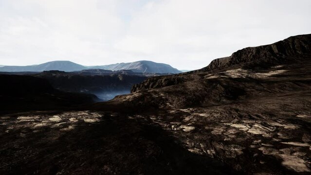 black volcanic basalt rock formations in the low light