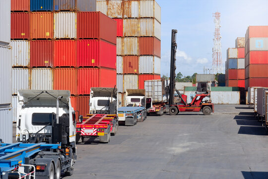Container forklifts and trucks view of transport and industry - Powered by Adobe