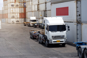 Trucks in the container depot in the import and export area at the port.