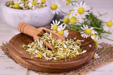Fototapeta na wymiar Dried chamomile for medicinal tea, homeopathic remedies.