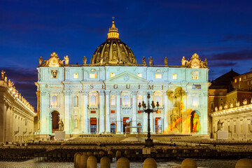 St. Peter's basilica in Vatican at night, center of Rome, Italy