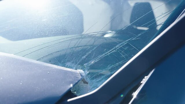 Smashed Toyota Rav 4car after a car accident on the snowy road