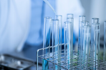 Close-up of a scientist's hand doing research in a laboratory