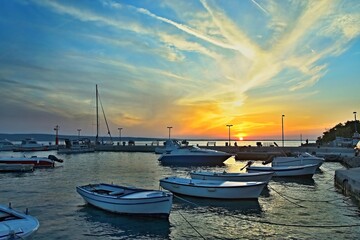 Fototapeta premium Croatia-view of a the harbor in town Starigrad at sunset