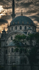 Fototapeta na wymiar mosque at sunset in Istanbul with clouds
