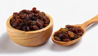 Raisins in wooden bowl isolated on white background.