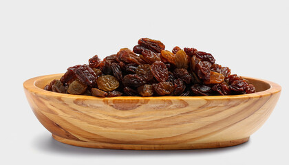 Raisins in wooden bowl isolated on white background.