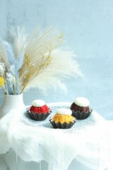 Decorated cupcakes in different colors