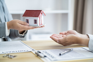 Business people signing contract making deal with real estate agent Concept for consultant home...