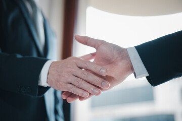 Negotiating business,Image of businessmen Handshaking,Handshake Gesturing People Connection Deal Concept