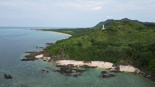 Ishigaki, Japan: Aerial drone footage of the Hirakubozaki Lighthouse in the Ishigaki island in Okinawa in Japan. Shot with an orbit motion