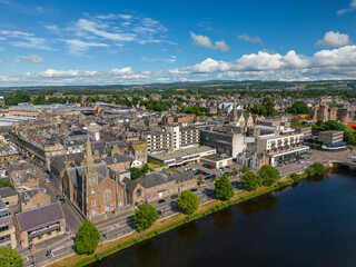 Naklejka premium An aerial drone photo of the town centre in Inverness and the river Ness which goes through the town in Scotland.