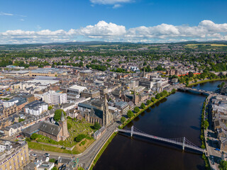 An aerial drone photo of the town centre in Inverness and the river Ness which goes through the town in Scotland.