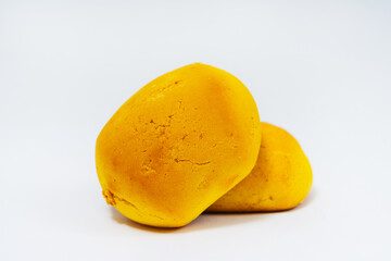 gingerbread from cornmeal on a white background. gingerbread from yolk flour on a light background. floury colorful sweets for the holiday