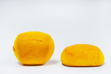 gingerbread from cornmeal on a white background. gingerbread from yolk flour on a light background. floury colorful sweets for the holiday