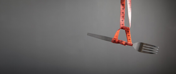Measuring tape with fork. Diet