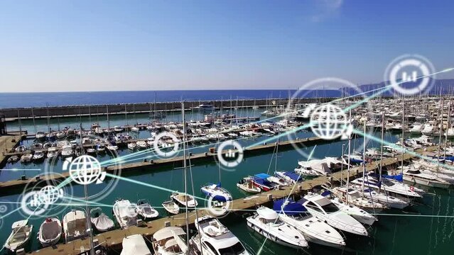 Animation of graph and globe connected icons over aerial view of boat parked at marina