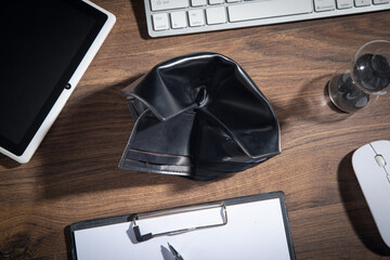 Empty wallet on the wooden table.