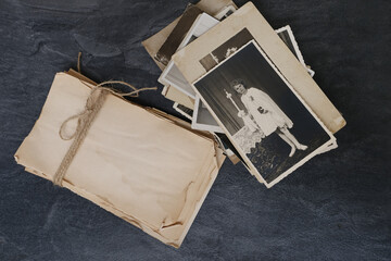 vintage photographs, empty stack rustic aged paper torn off edges for message, designer text,...