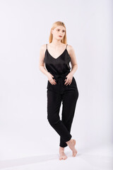 Portrait of an elegant and beautiful blonde girl on a white background