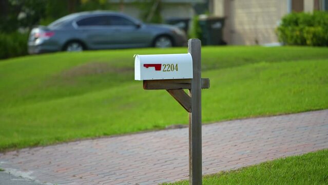 American mailbox at Florida home front yard on suburban street side