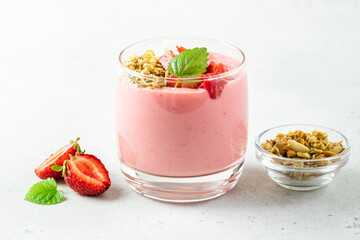 Srawberry yogurt parfait in glasses. Copy space, flat lay.
