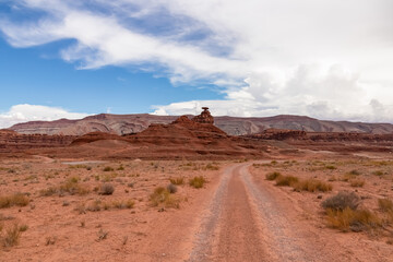 Scenic view of the sombrero shaped rock formation of Mexican Hat on the San Juan River on the northern edge of the Navajo Nations borders in south central San Juan County, Utah, USA