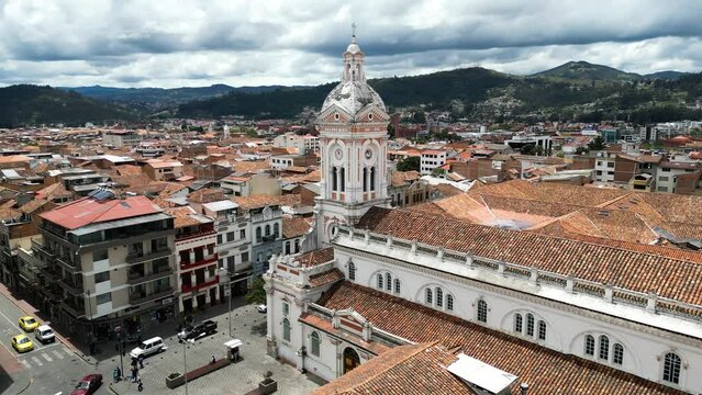Aerial view of the new cathedral of Cuenca with the architectures and mountain in the background