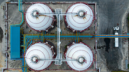 Aerial top view LPG Liquefied Petroleum Gas storage tank, LPG gas storage tank and pipeline industrial plant, LPG distribution station facility and gas manufacturing industry.